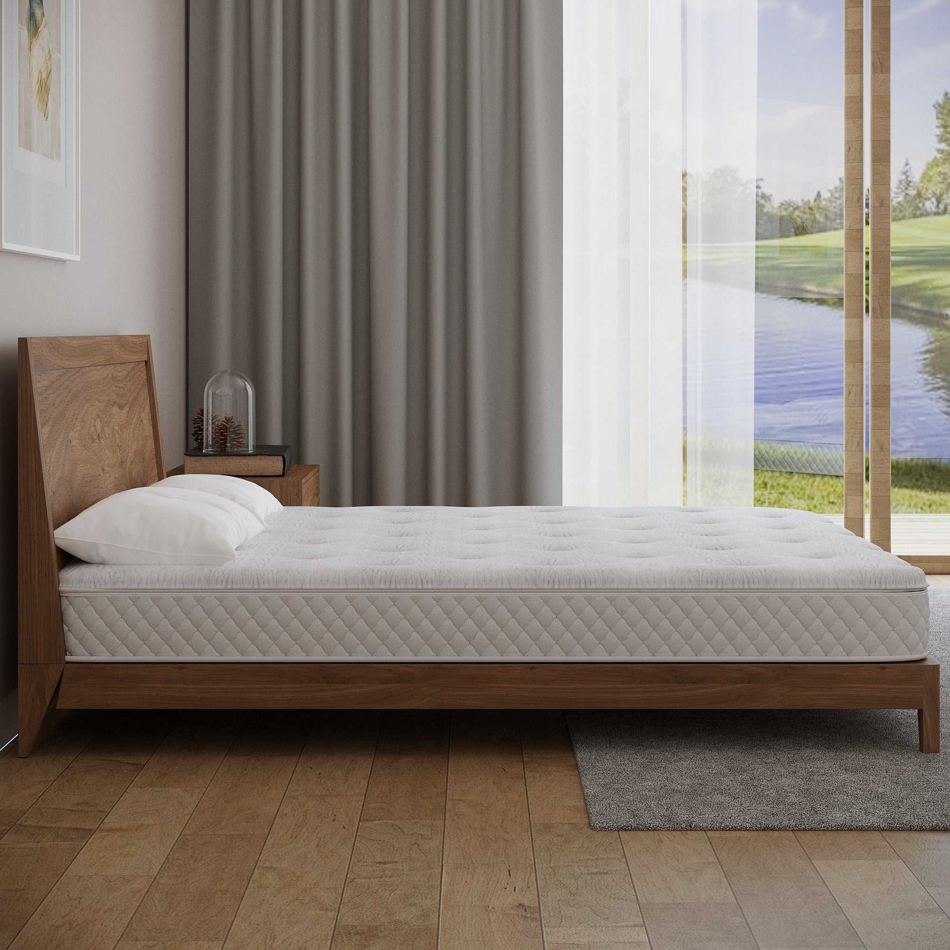 Sterling Sleep Eco-Luxury Natural Latex Mattress shown in a mid-century modern low wood bed frame in a contemporary bedroom. Sterlingsleep.com